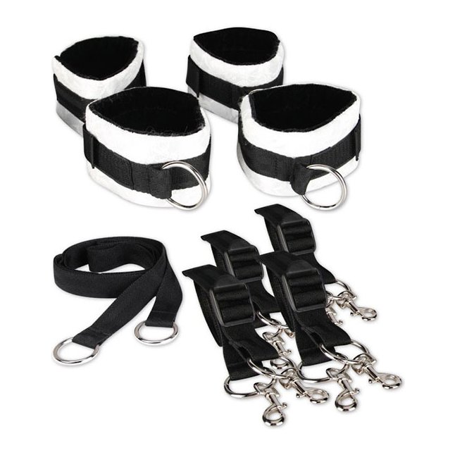 Две пары черно-белых кружевных наручников, крепящиеся к матрасу