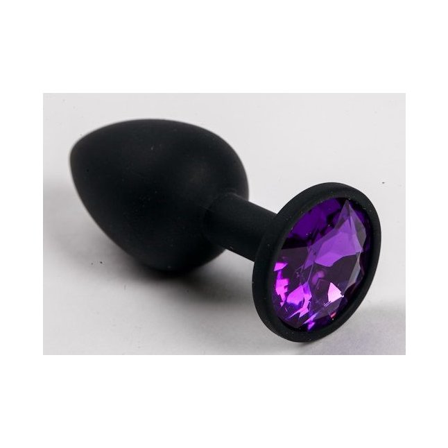 Черная силиконовая анальная пробка с фиолетовым стразом - 7,1 см