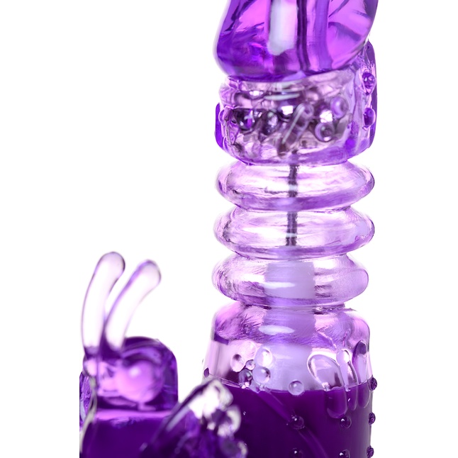 Фиолетовый вибратор с ротацией бусин, клиторальным стимулятором и надёжной присоской. Фотография 11.