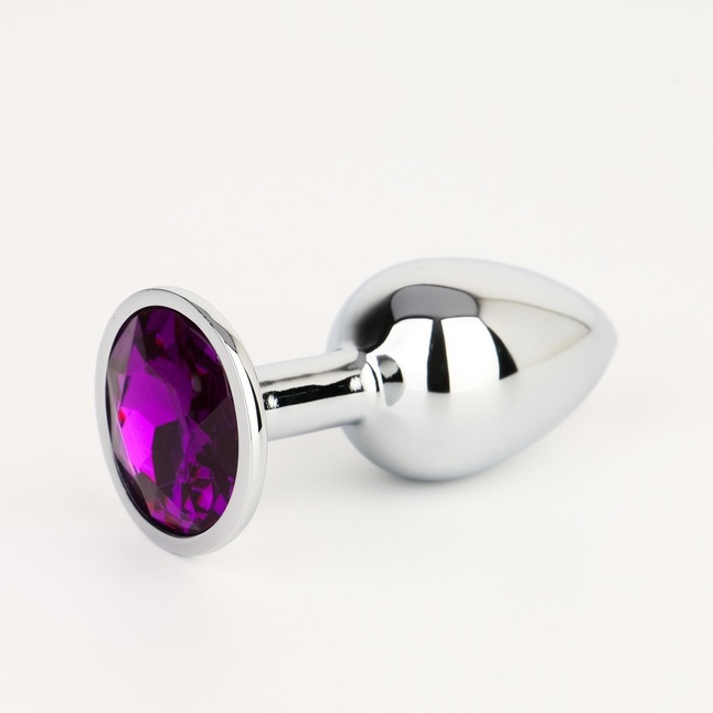Серебристая анальная втулочка с фиолетовым кристаллом - 7 см - Оки-Чпоки. Фотография 2.