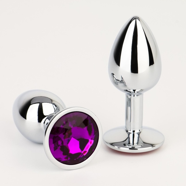 Серебристая анальная втулочка с фиолетовым кристаллом - 7 см - Оки-Чпоки
