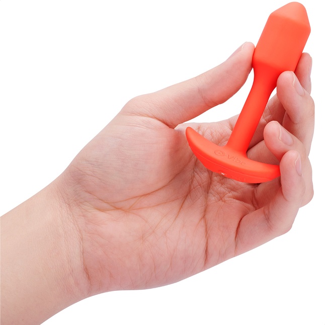 Оранжевая вибропробка для ношения B-vibe Snug Plug 1 - 10 см. Фотография 4.