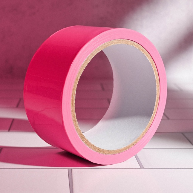 Розовая лента для бондажа Pink Bondage Tape - 20 м. Фотография 8.