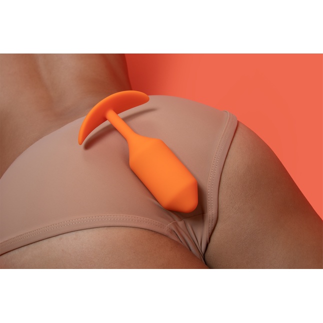 Оранжевая пробка для ношения B-vibe Snug Plug 3 - 12,7 см. Фотография 7.