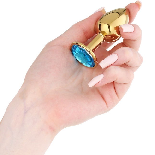 Золотистая анальная пробка с голубым кристаллом - 7 см - Оки-Чпоки. Фотография 3.