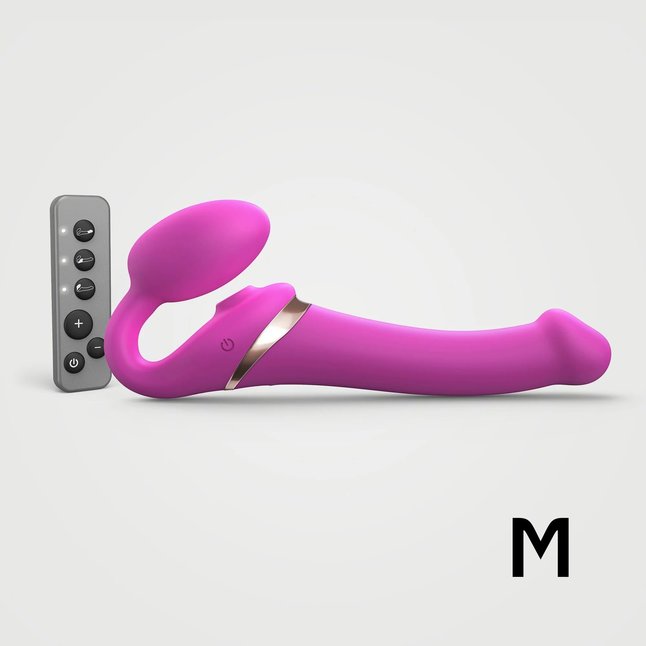 Ярко-розовый безремневой страпон Multi Orgasm Size M с клиторальной стимуляцией. Фотография 2.
