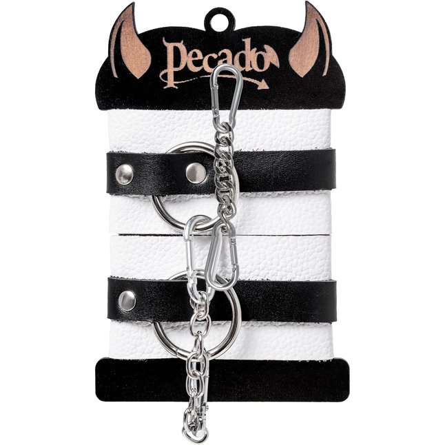 Бело-черные кожаные наручники с одним ремешком с люверсами. Фотография 5.