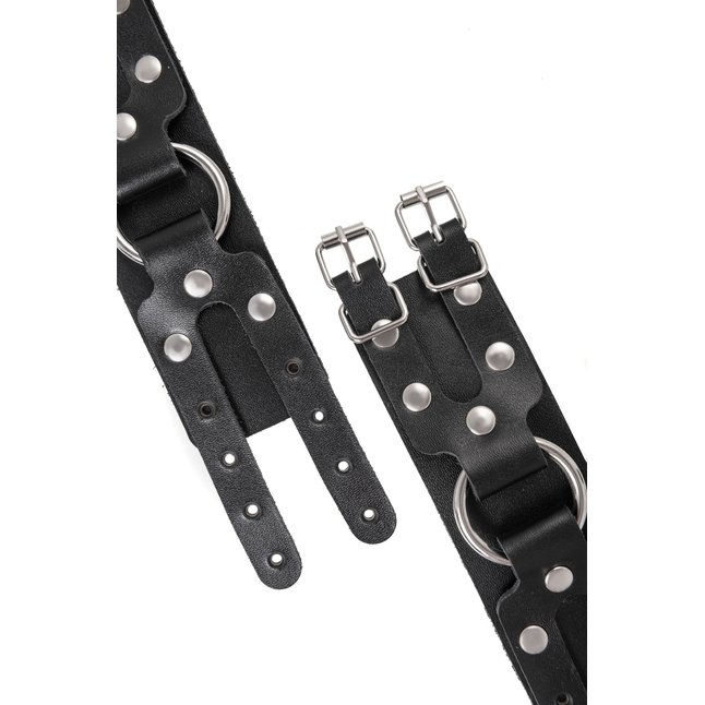Черные кожаные наручники-браслеты с двумя ремешками. Фотография 6.