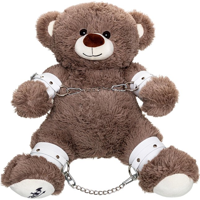 Бондажный набор: бурый мишка с белыми оковами и наручниками. Фотография 2.