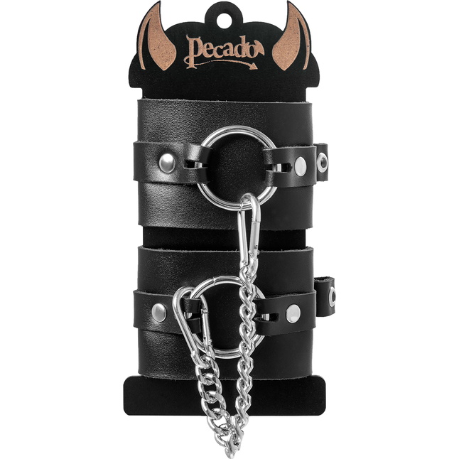 Черные наручники из толстой натуральной кожи с люверсами. Фотография 7.