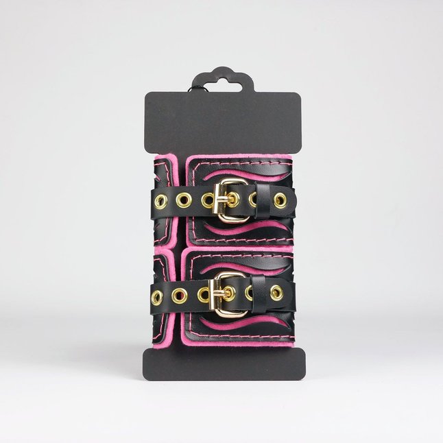 Черные кожаные наручники с розовой строчкой. Фотография 3.