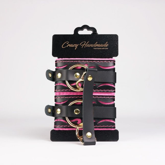 Черные кожаные оковы с розовой строчкой. Фотография 2.