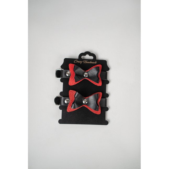 Черно-красные кожаные наручники с бантиками. Фотография 2.