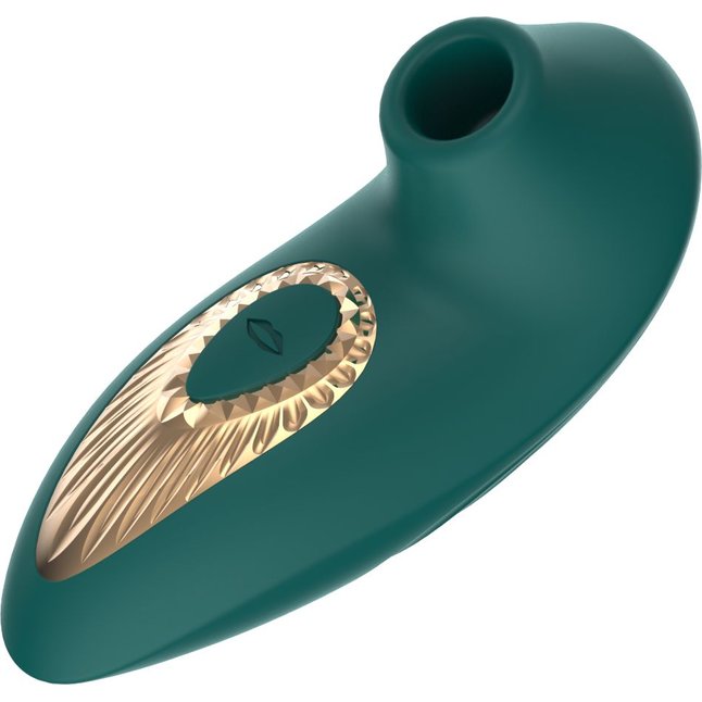 Зеленый вакуумный стимулятор клитора. Фотография 5.