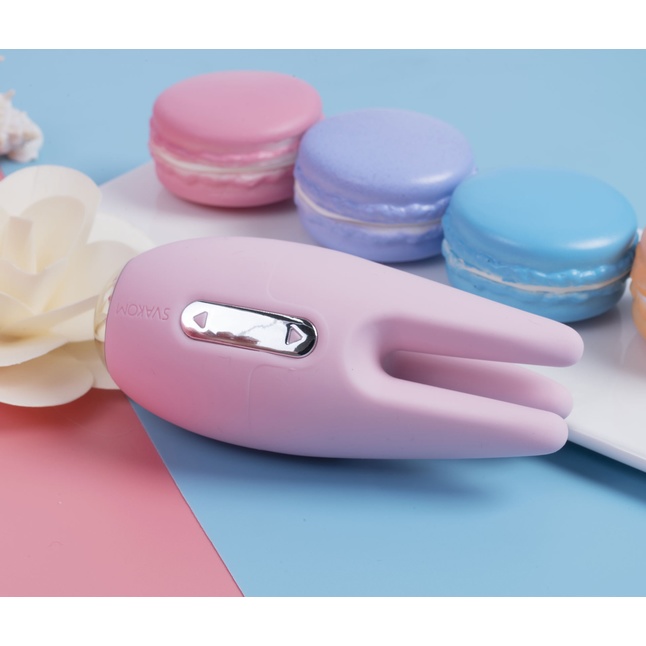 Розовый вибростимулятор клитора Cookie с подвижными щупальцами. Фотография 13.