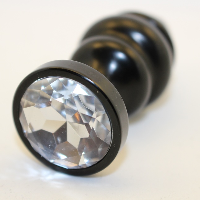 Черная фигурная анальная пробка с прозрачным кристаллом - 8,2 см. Фотография 2.