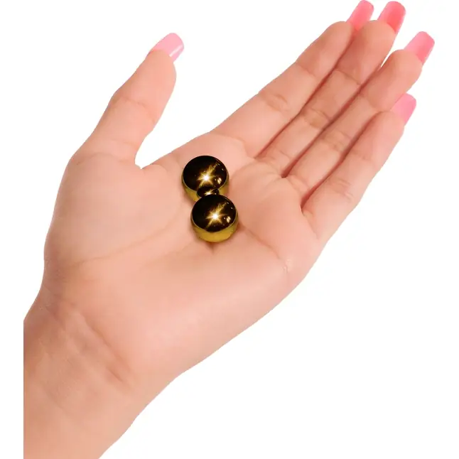 Вагинальные шарики Ben-Wa Balls золотистого цвета - Fetish Fantasy Gold. Фотография 3.