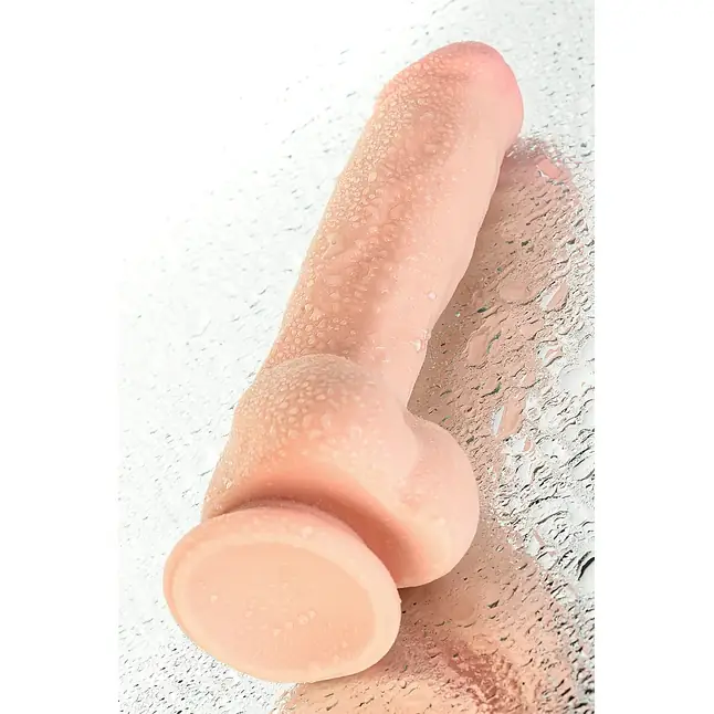 Телесный реалистичный вибратор-ротатор Ulric - 24 см - RealStick Elite. Фотография 15.