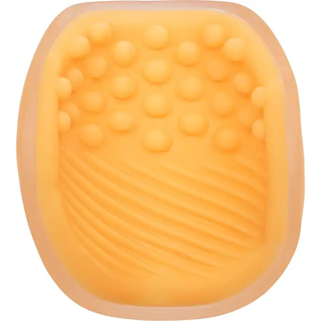 Оранжевый рельефный мастурбатор Dual Grip - The Gripper. Фотография 2.