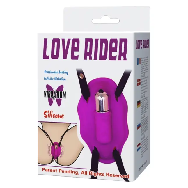 Лиловый вибростимулятор для клитора Love Rider на ремешках. Фотография 8.