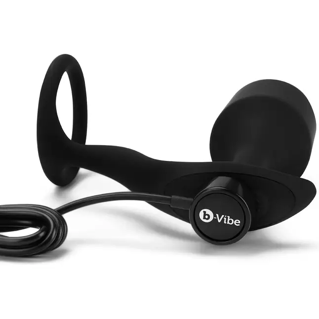 Черная анальная вибропробка с эрекционным кольцом Vibrating Snug Tug XL. Фотография 3.