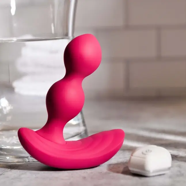 Розовые анальные шарики с вибрацией и расширением Bubble Butt - 12,3 см. Фотография 10.