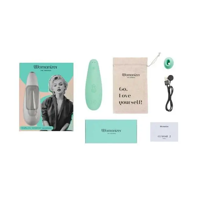 Мятный бесконтактный клиторальный стимулятор Womanizer Marilyn Monroe Special Edition. Фотография 2.