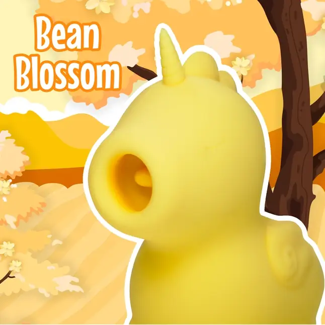 Желтый клиторальный вибромассажер Unihorn Bean Blossom с подвижным язычком. Фотография 6.