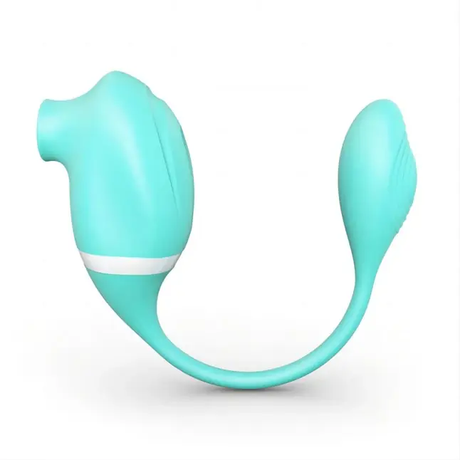Мятный вакуумный вибростимулятор Tadpole Vibrating Dual Stimulation с виброхвостиком. Фотография 3.