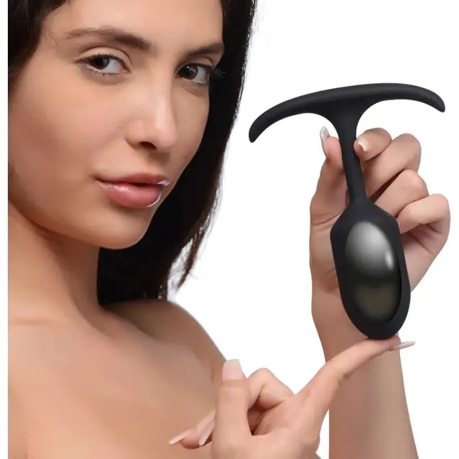 Черная анальная пробка с утяжелением Premium Silicone Weighted Anal Plug Medium - 14 см - Heavy hitters. Фотография 3.